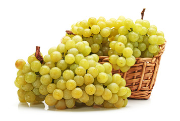 Fresh grape fruits with green leaves isolated on white background