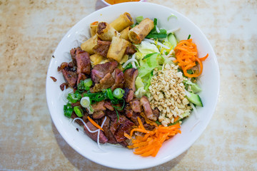Grilled pork and spring roll rice vermicelli salad