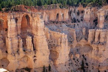 The spectacle of thousands of glowing orange earthen spires concentrated in the valley below the...