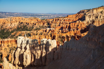 The spectacle of thousands of glowing orange earthen spires concentrated in the valley below the rim of Bryce Canyon National Park is an amazing site