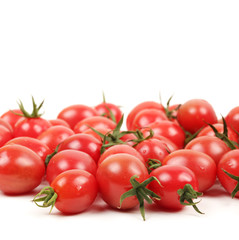 small cherry tomato on the background