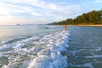 Woman with bikini relax wave on beach