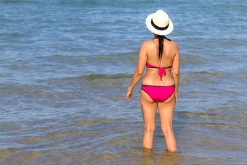 Woman and bikini pink body sexy on beach
