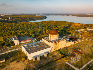 Abandoned and ruined Nuclear Power Plant for heat supply in Voronezh, aerial view from drone