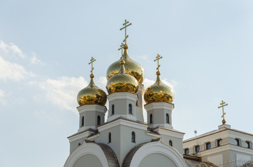 Fototapeta na wymiar Old Christian Church with gold domes.