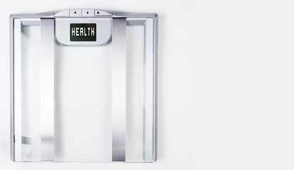 sliver electric bathroom scale  with help on white background.  Health and weight loss Concept. Copy Space