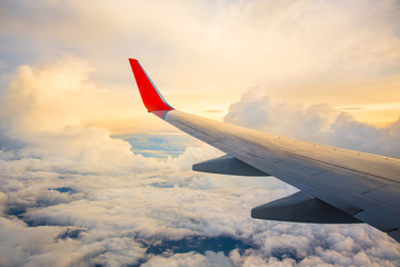 Vintage color of Morning sunrise with Wing of an airplane. Photo applied to tourism operators. picture for add text message or frame website. Traveling concept