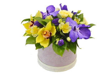 Bouquet of flowers in a hat box isolate on a white background.