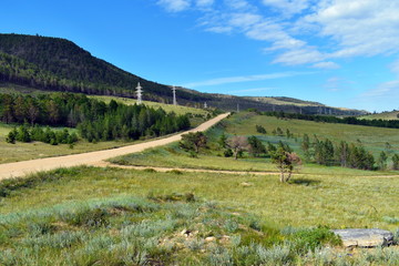 Fototapeta na wymiar Idyllic mountain landscape with forest.