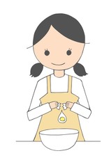 卵を割る女性