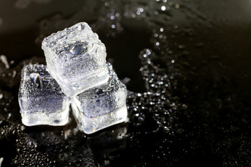 ice cubes on black background.
