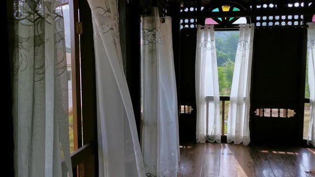 A breezy praying room of a traditional Malay home.