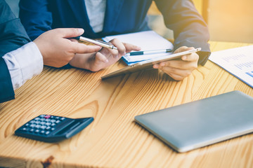 Business people are analyzing and planning business. Business Strategy Consulting