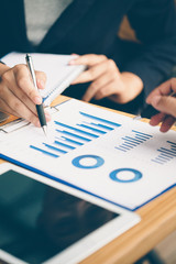 Business people are analyzing and planning business. Business Strategy Consulting