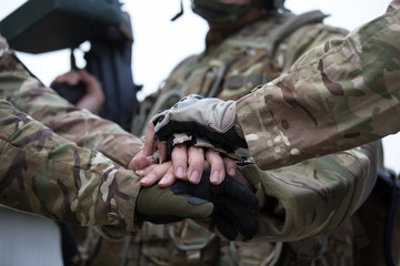 World War II, the worrier scene of the Entente Powers or Allies and Axis. The scene and arms in World War 2. Soldier hand together as power and peace