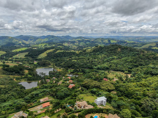 Aerial view of luxury villa in tropical valley. Monte Alegre Do Sul. Brazil. Countryside destination for local tourist.