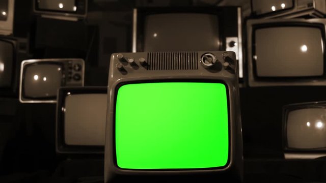 Gun Shooting Into Glass of an Old Retro TV with Green Screen. Sepia Tone. Zoom Out. 