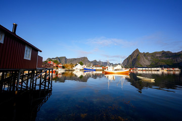 Fototapeta na wymiar Morning in the Hamnoy fishing village. This is a popular tourist destination for tourists and photographers in the Lofoten Islands, Norway.