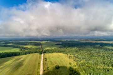 Beautiful views of the countryside from a great height. Flying above the clouds.