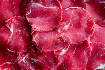 Fresh raw marbled bacon from slided red beef for shabu, BBQ or grill.