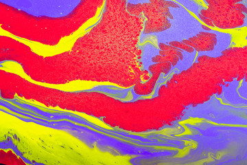 Acrylic Fluid Art. Glowing Red, violet and yellow waves with gold inclusion. Abstract background or texture
