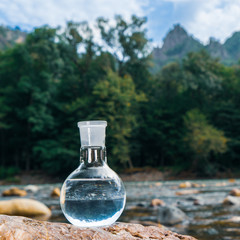Glass flask with clean drinking water.