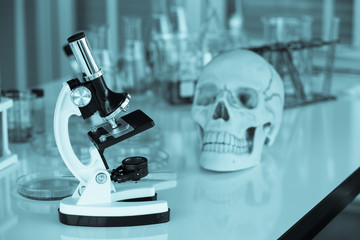 Chemical tube set development and pharmacy in laboratory with green bokeh through windows