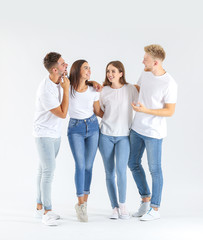 Fototapeta premium Group of young people in stylish casual clothes on white background