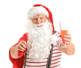 Santa Claus with gifts and cocktail on white background