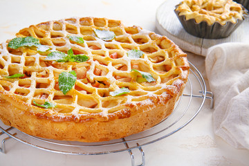 Tasty apple pie on table