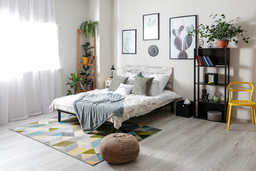Stylish interior of modern bedroom