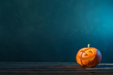 Poster Im Rahmen Halloween pumpkin on dark background © Maya Kruchancova