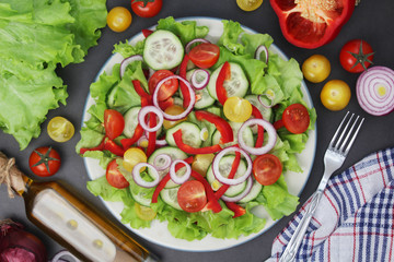 A plate full of bright fresh vegetable salad