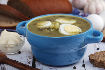 A bowl with homemade sorrel soup