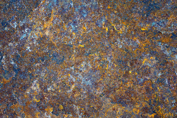 Abstract grunge rustic background. Colorful rusty background. Selective focus