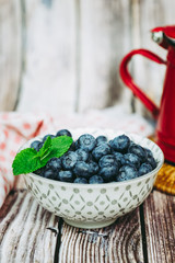 Petit pot de myrtilles et menthe fraiche	