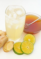 Iced ginger tea with lime and honey close up
