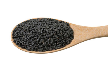 Black sesame seeds in wooden spoon and spread isolated on white background.Scientific name is Sesamum orientale L.Herb. cereal. top view.