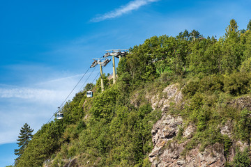 Fototapeta na wymiar Overhead cable car in Italian Alps, Val di Fiemme, Cavalese, Cermis, Trentino Alto Adige, Italy, south Europe