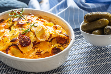 Roasted potatoes in baking dish traditional easten european food titled as france potato