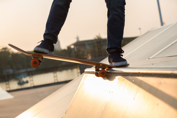 Fototapeta na wymiar Skateboarding on skatepark ramp