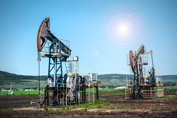 Oil pumpjack, industrial equipment. Rocking machines for power generation. Extraction of oil. Oil well industry.