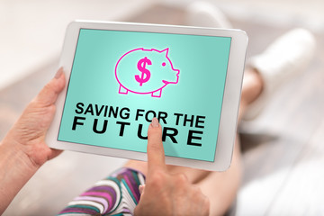 Saving for the future concept on a tablet