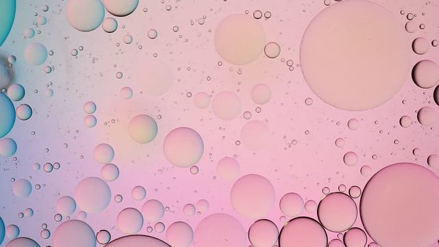 Colorful artistic image of oil drop on water for modern and creation design background.
