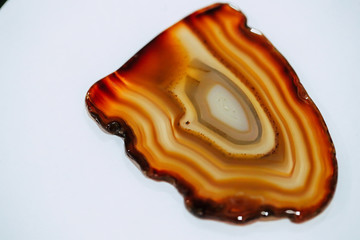 brown gold agate gem stone isolated closeup background