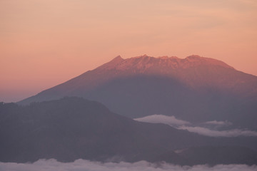 Landscape view of volcano crater Ijen at sunrise