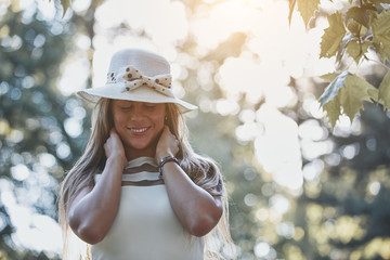 Young woman enjoying in autumn colored nature.