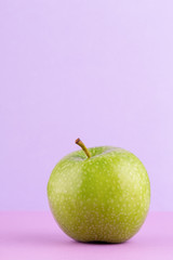 Creative layout made of green apples. Flat lay. Food concept.