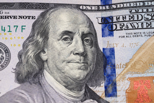 Dollars background, hundred USA dollar banknote bills, many American cash money, finance concept, selective focus.