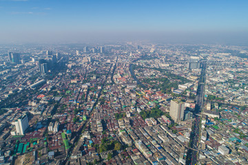 Fototapeta na wymiar Bangkok building of house and flat with traffic road
